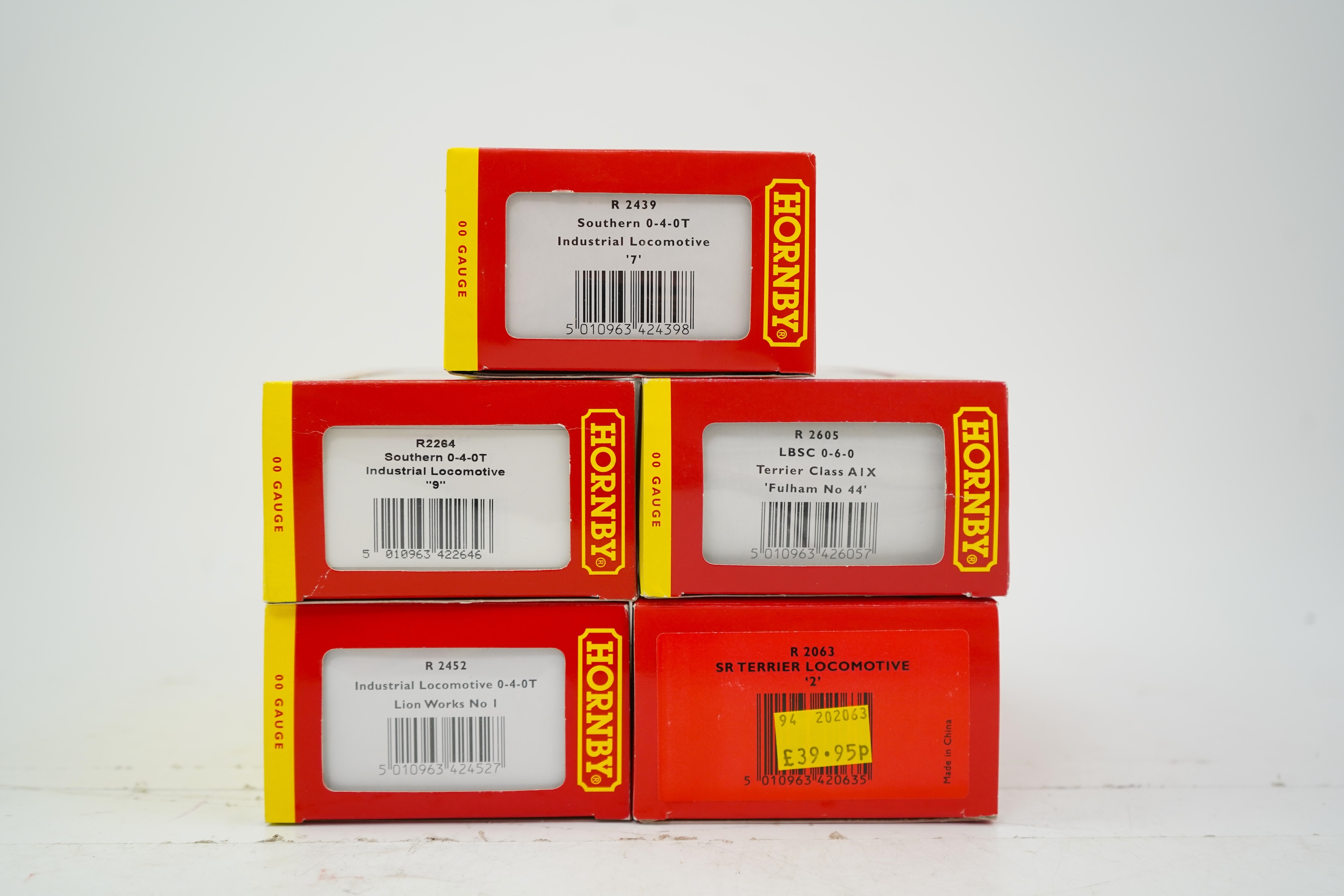 Five boxed Hornby Railways 00 gauge railway tank locomotives; an SR class A1X Terrier, Freshwater 2, (R2063), an LBSCR Terrier, Fulham 44, (R2605), an SR 0-4-0T industrial locomotive, 7, (R2439), a Lion Works 0-4-0T indu